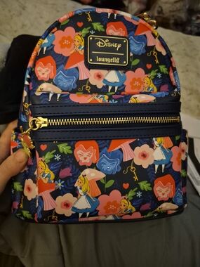 Loungefly Navy Alice in Wonderland Floral all over Print Mini Backpack